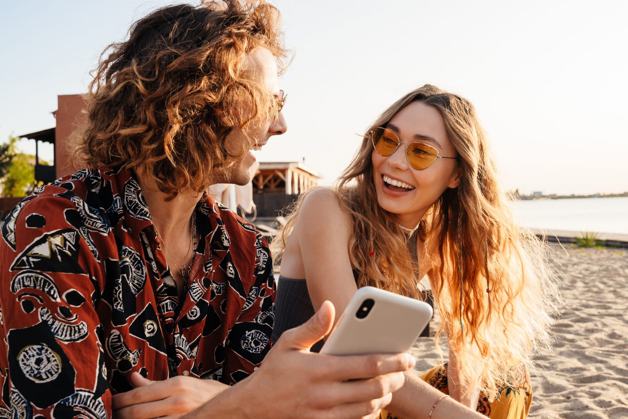 A couple looking at social media together on a phone
