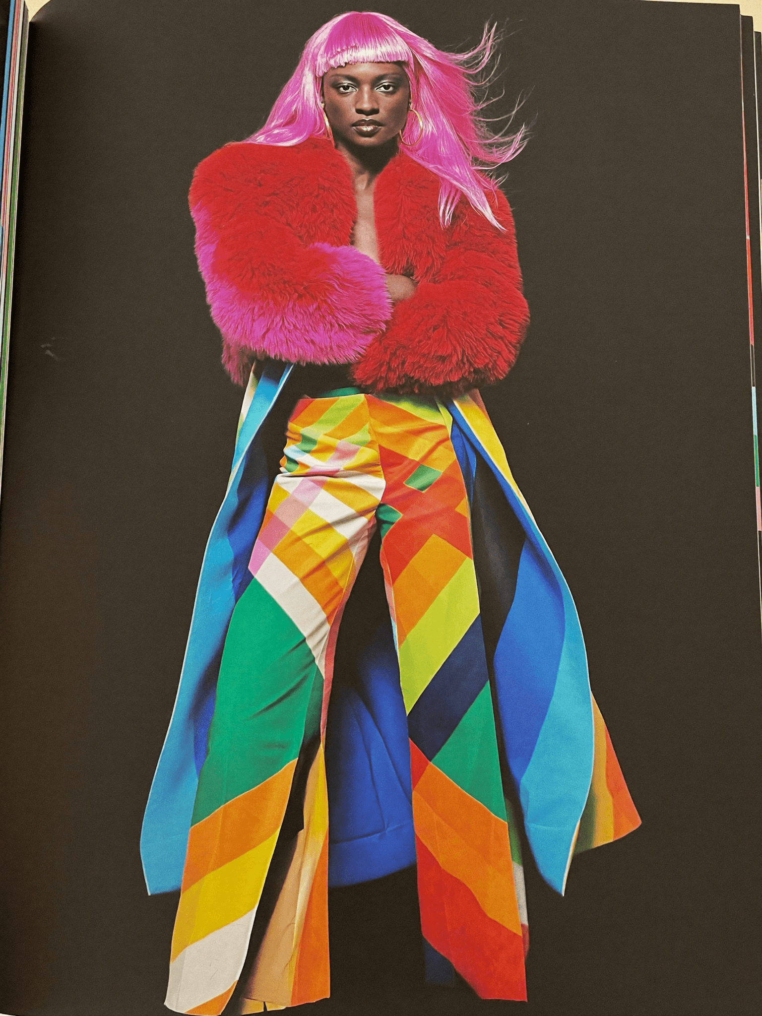 A model in a vivid editorial look