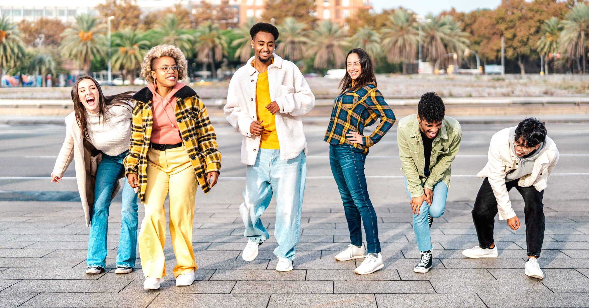 A group of young people walking in a city